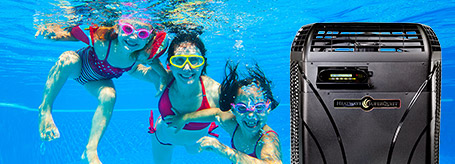 mother and daughters swimming in pool with AquaCal heat pump